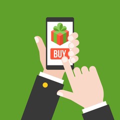 Business hand buy gift from smartphone or cellphone