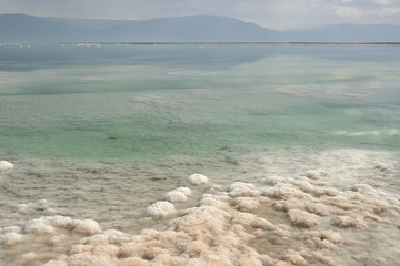 Dead Sea and overcast sky in cloudy weather
