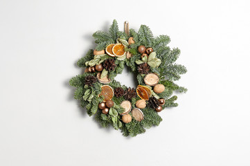 Rustic Christmas wreath on a gray background