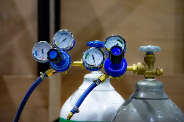 Oxygen cylinder and regulator gauge in factory., equipment