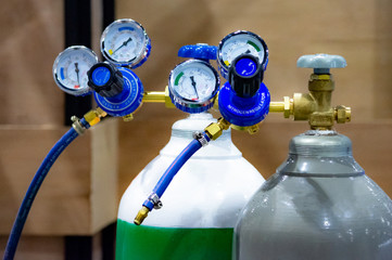 Oxygen cylinder and regulator gauge in factory., equipment