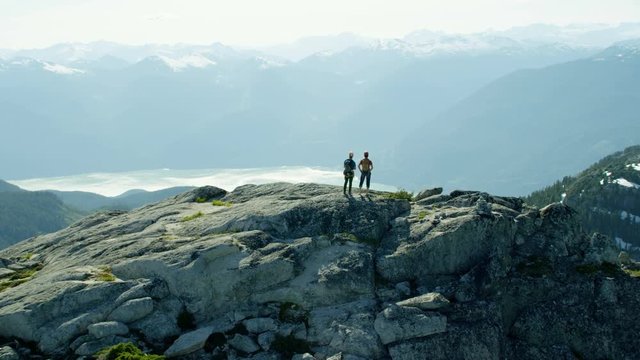 Aerial climbers reaching peak of Mt Habrich Canada