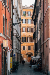 Fototapeta na wymiar Vicolo del Curato, a narrow street in Rome, Italy