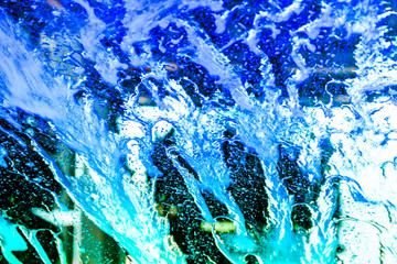 Colorful water trickling down for a beautiful and exciting abstract background