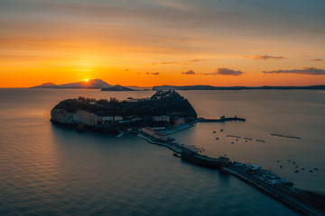 A view of the Islet Of Nisida at sunset, from Parco Virgiliano, in Posillipo, Naples, Italy