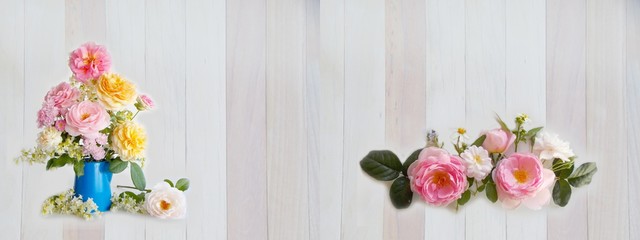 Beautiful rose bouquet on wooden background.