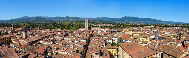 Fototapeta na wymiar Panorama view on city from Torre delle Ore clock tower in Lucca. Italy