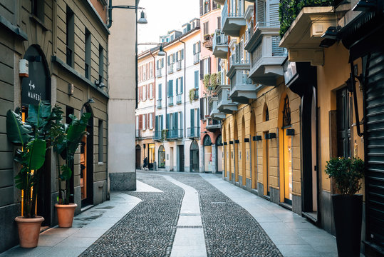 Fototapeta A colorful cobblestone street in Brera, Milan, Italy.