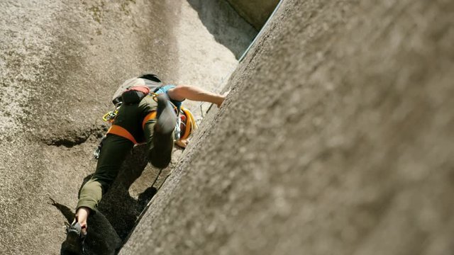 Young climber using rope in Squamish Valley Canada