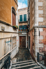 Fototapeta na wymiar A narrow alley in Venice, Italy
