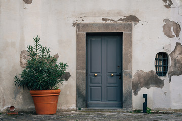 Fototapeta na wymiar A blue Door at Castel Sant'Elmo, in Naples, Italy.jpg