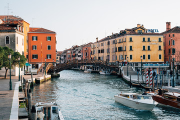 Fototapeta na wymiar Boats in a canal, in Venice, Italy