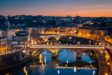View of the River Tiber at night from Castel Sant'Angelo, in Rome, Italy