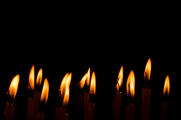 Candle flame set isolated in black background.
