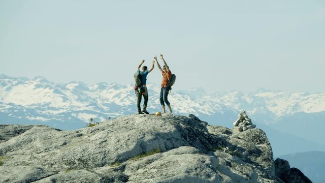 Aerial climbers celebrating success in Squamish Valley Canada