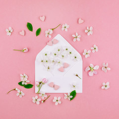 Concept of love letter with envelope and flowers