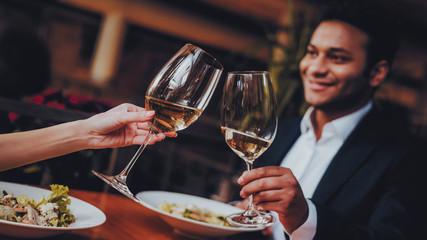 Cheerful Couple in Love Dating in Restaurant