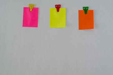 Empty colorful post its on the wall.