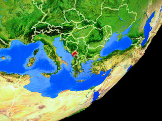 Montenegro on planet Earth with country borders and highly detailed planet surface.