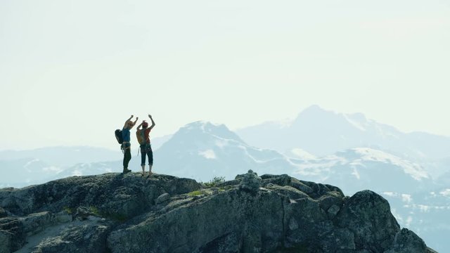 Aerial climbers on mountain summit Squamish Valley Canada
