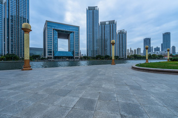 empty floor and city skyline under blue sky, tianjin, china.
