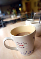 Simple white filter coffee in a basic mug in a cafeteria