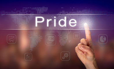 A hand selecting a Pride business concept on a clear screen with a colorful blurred background.