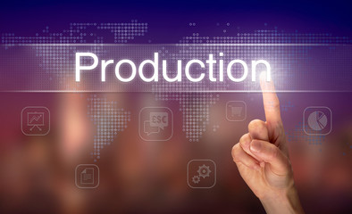 A hand selecting a Production business concept on a clear screen with a colorful blurred background.