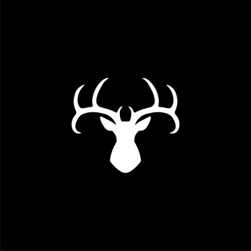 Silhouette head deer, Deer head icon or logo on dark background