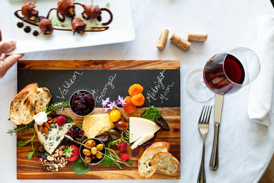 Charcuterie Plate Served with Wine and Bacon Wrapped Figs
