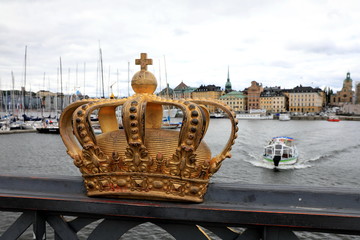 Golden crown on Skeppsholm bridge ,Stockholm , Sweden