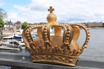 Fototapeta na wymiar Golden crown on Skeppsholm bridge ,Stockholm , Sweden