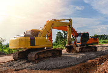 road construction with backhoe loader / yellow tractor loader backhoe