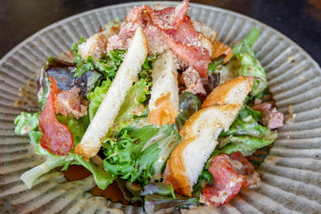 spicy salad bacon / green lettuce salad with ham pork bread bacon