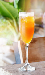orange juice in glass / fresh orange juice in the wine glass