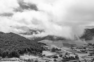 Fantastic black and white view of clouds above the Sete Cidades caldera on the island of Sao Miguel in the Atlantic.