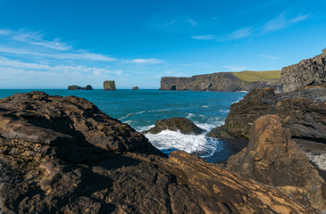 Fototapeta na wymiar Volcanic cliffs along south Iceland coast
