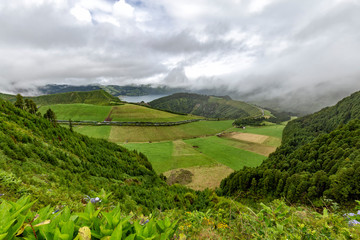 View of calderas and lakes at the edge of the Sete Cidades Caldera on the island of Sao Miguel in the Azores.