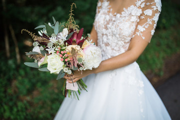white roses in wedding bouquet