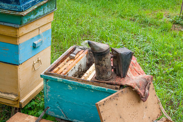 Old smoker on open beehive body ..