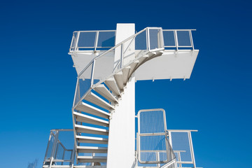 Outdoor swimming pool diving board