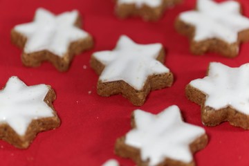 Cinnamon stars with a red background.