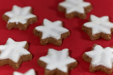Cinnamon stars with a red background.