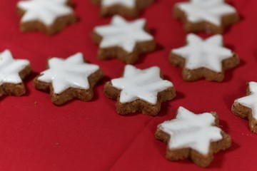 Cinnamon stars with a red background.