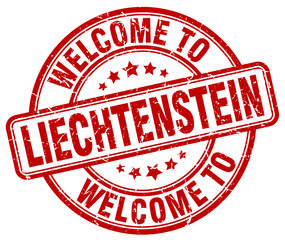welcome to Liechtenstein red round vintage stamp