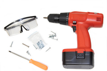 Screwdriver on a white background. Tools on a white background. Items for the repair and collection of furniture.