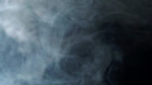 Smoke at isolated black backround. Smoking shisha, hookah, cigarette or vape