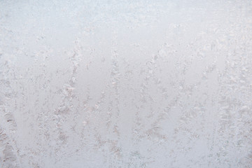 Background ice on the glass. Frost. The texture of frost. The glass is frozen.