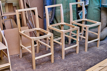 Woodworking and carpentry production. Making wooden frame chairs. Furniture manufacture