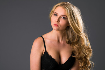 Fototapeta premium Sexy blonde woman in black underwear